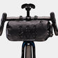 Bontrager Adventure Handlebar Bag 9L on the front of a bikes handlebars with a white background