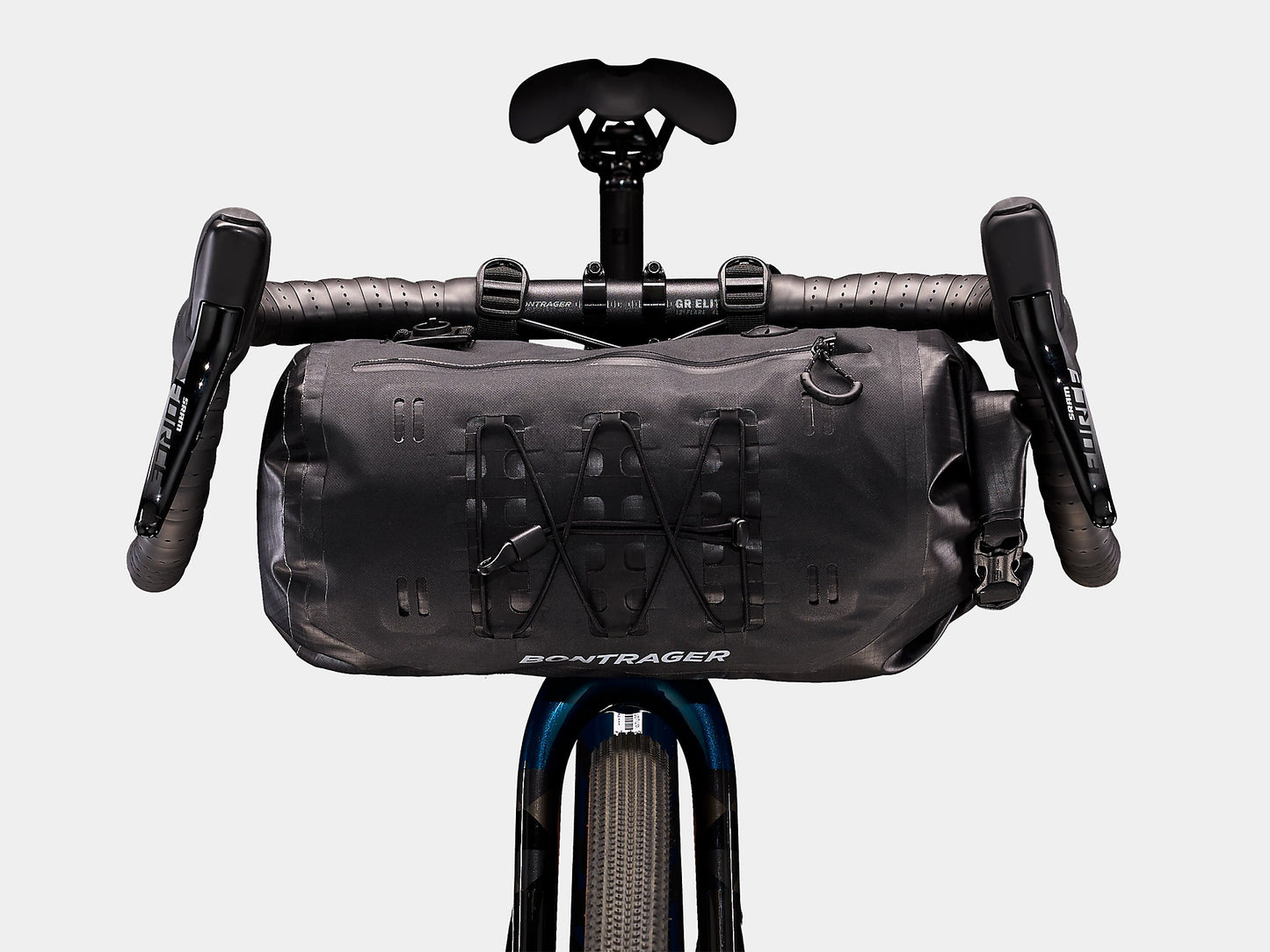 Bontrager Adventure Handlebar Bag 9L on the front of a bikes handlebars with a white background