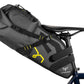 Apidura expedition saddle pack 17L attached to the back of a bike